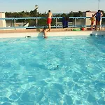 With Rooftop Pool *